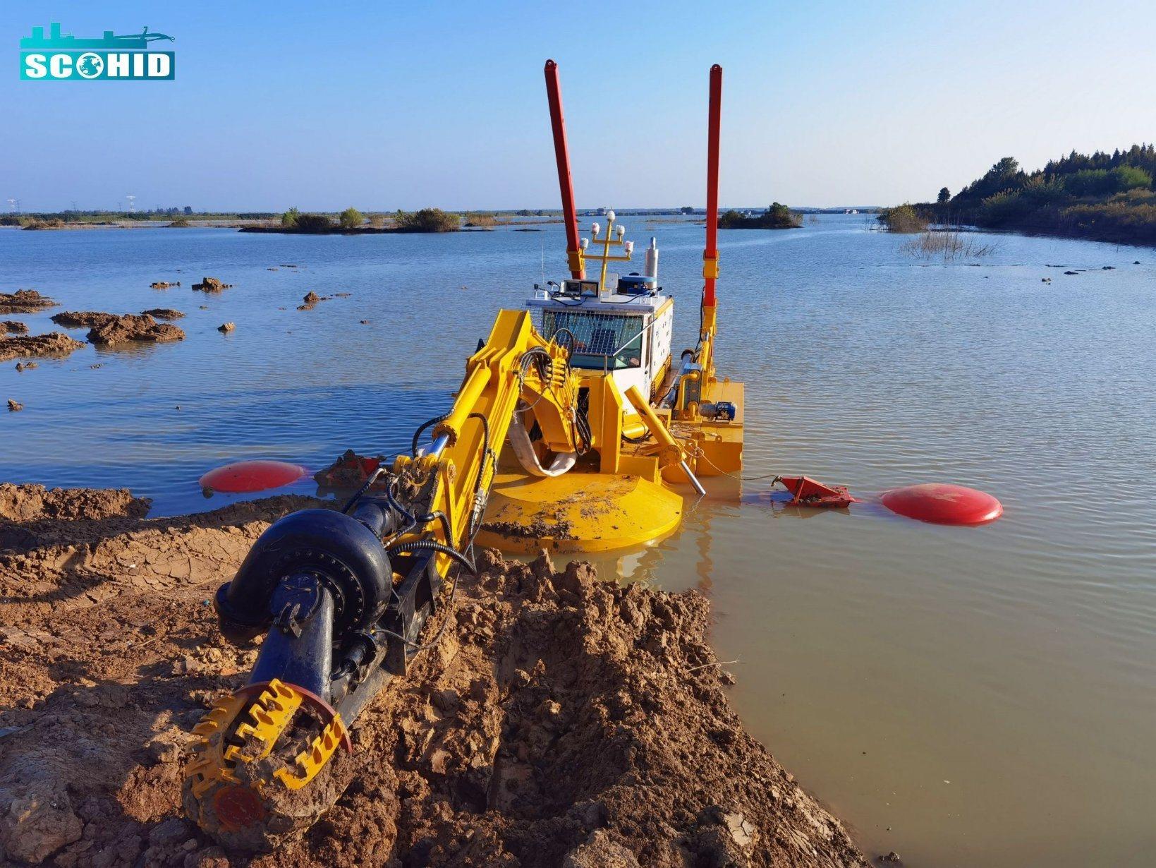 Solution intelligente de drague polyvalente amphibie pour référence de dragage en eaux peu profondes 