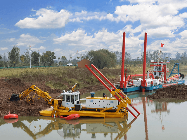 Solution intelligente de drague polyvalente amphibie pour référence de dragage en eaux peu profondes 